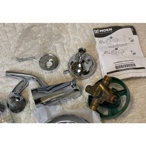 Moen 82603 Adler Posi-Temp Shower w/Shower Head & Tub Spout/ Has A Small scratch